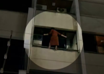 Moradora se pendura no parapeito de sacada para fugir de ladrão