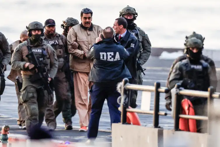 Captured Venezuelan President Nicolas Maduro arrives at the Downtown Manhattan Heliport, as he heads towards the Daniel Patrick Manhattan United States Courthouse for an initial appearance to face U.S. federal charges including narco-terrorism, conspiracy, drug trafficking, money laundering and others in New York City, U.S., January 5, 2026. REUTERS/Eduardo Munoz
